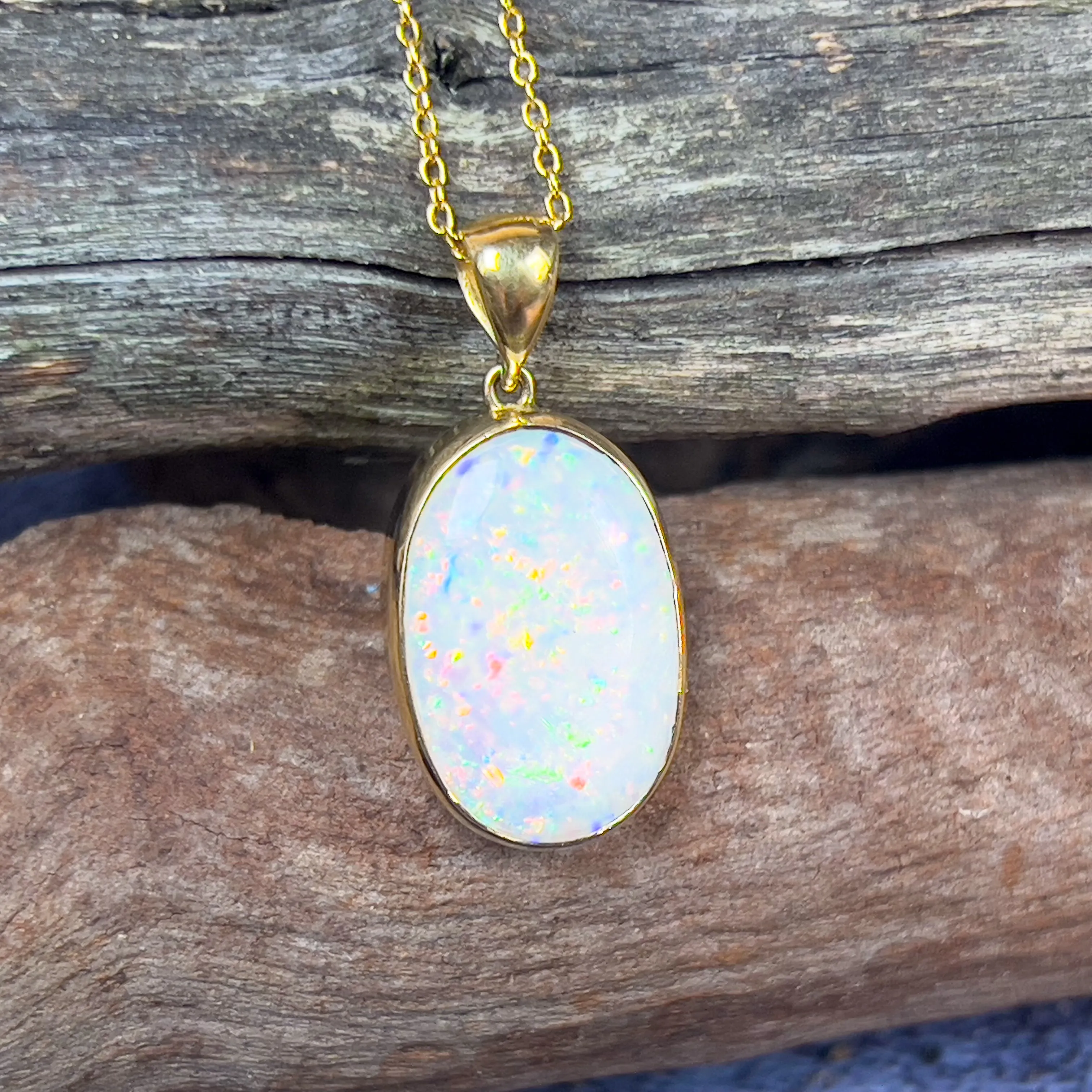 18kt Yellow Gold classic Oval White Opal 6.98ct bezel set pendant