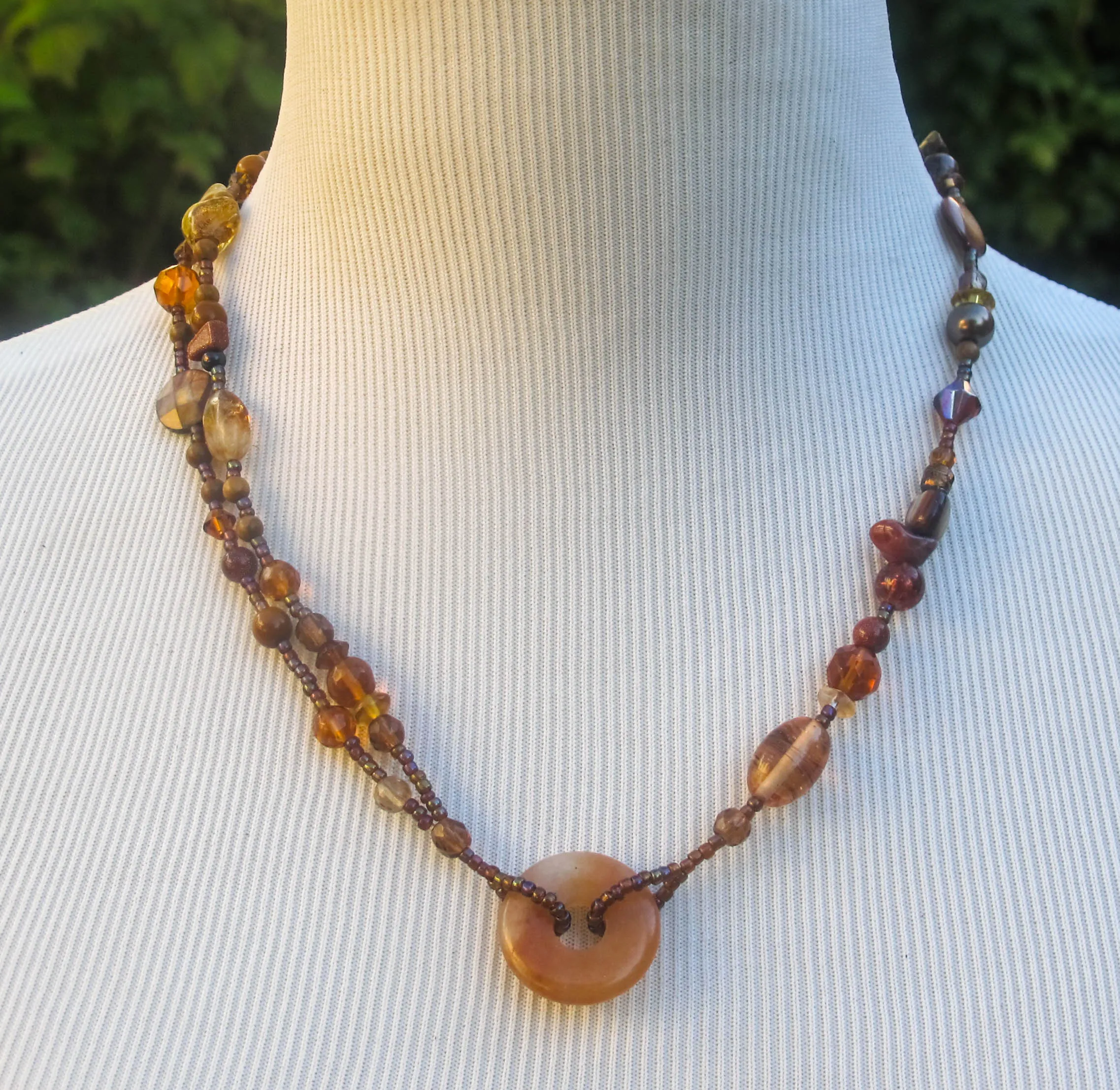 Asymmetrical, Multi-Strand Necklace w/Donut Center