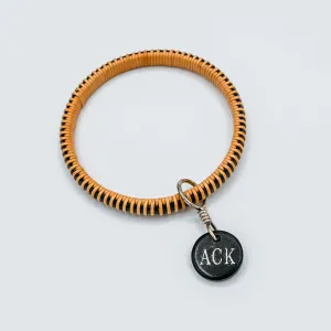 Black ACK Basket Weave Bangle