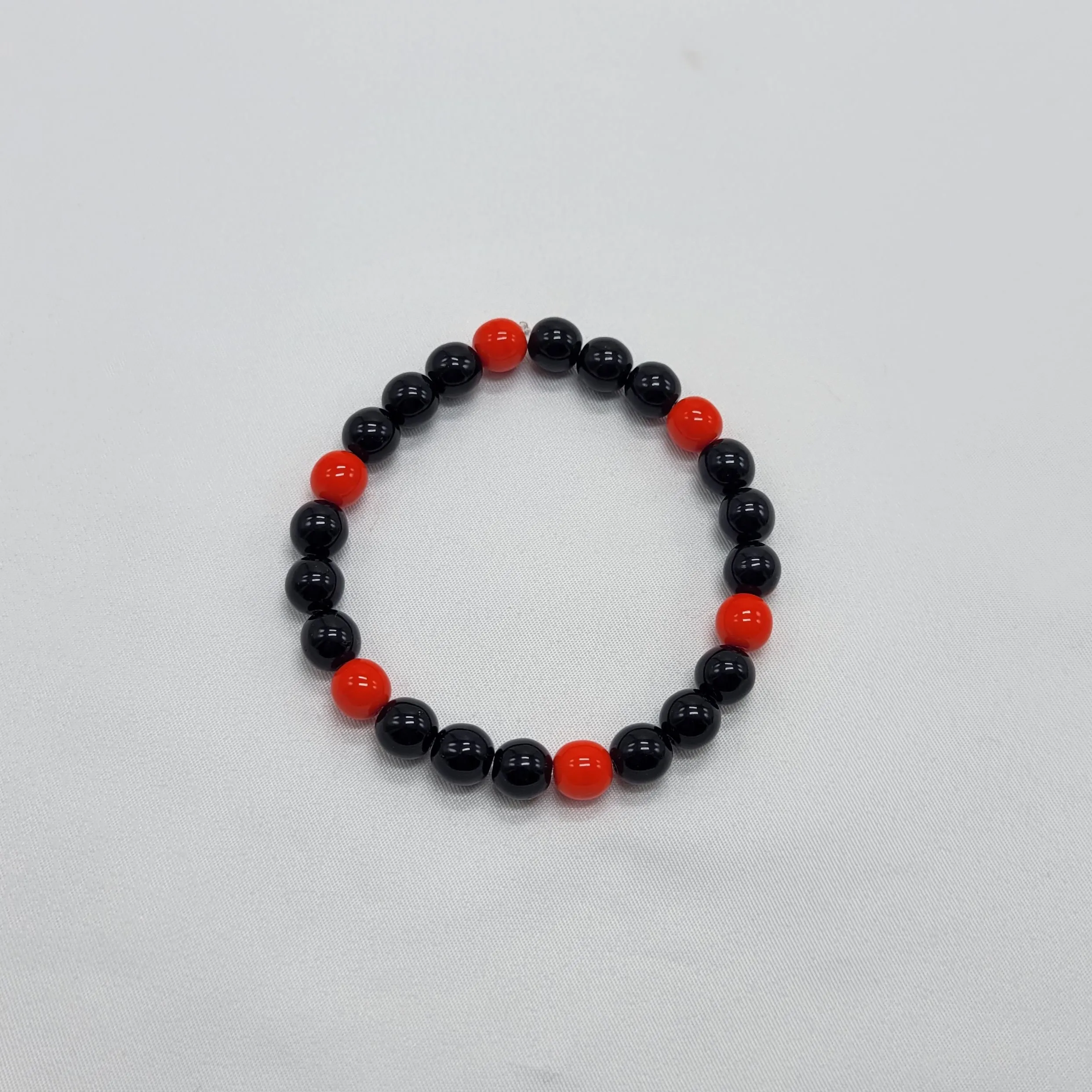 Black and Red Druk Bead Bracelet